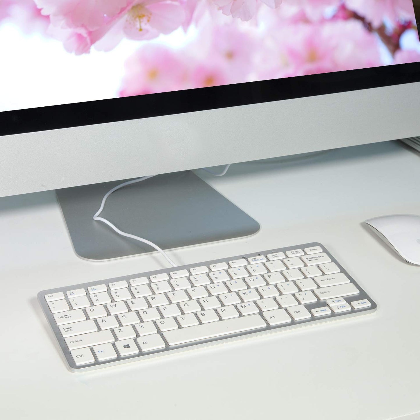 TRIXES Keyboard Mini Wired USB Key Board Slim Silver & White - Plug and Play - Compact and Durable - Suitable for PC, Computer, Apple Mac, Laptop, Windows etc