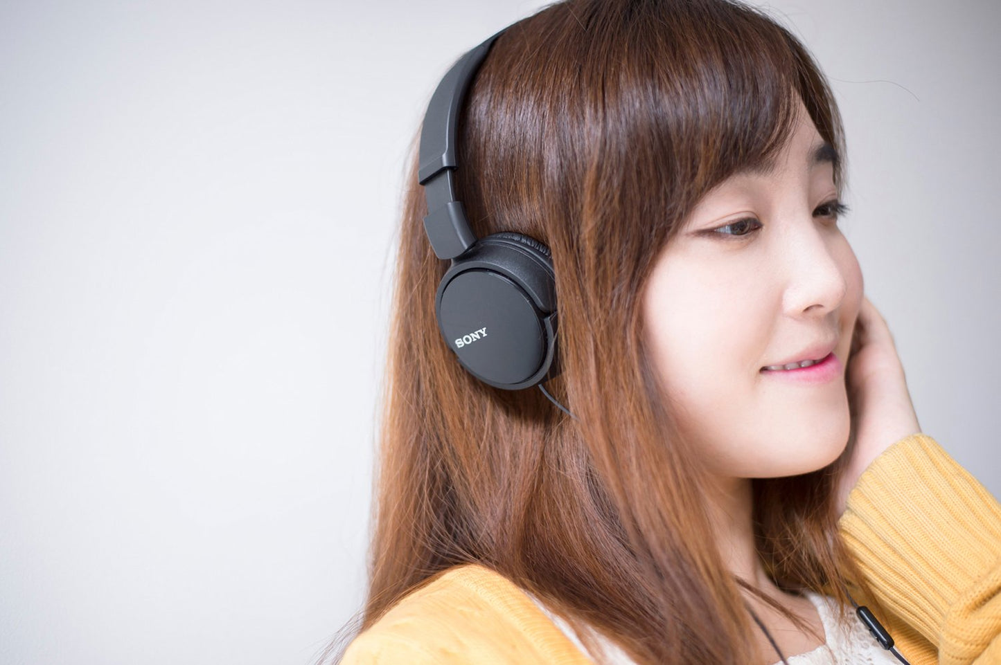 Sony MDR-ZX110AP Wired Overhead Headphones with Microphone, Neodymium Dynamic Drivers, Swivel Fold Design - Black